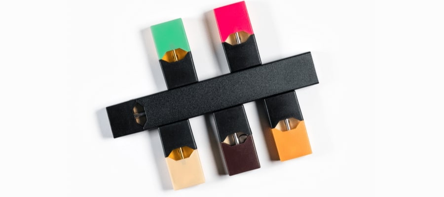 Image of JUUL pods and a USB battery source