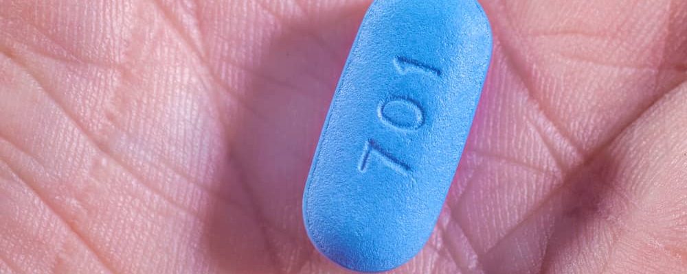 A Truvada pill in a persons hand